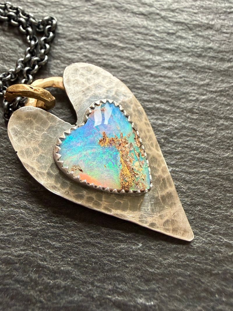 Blue opal heart set on a hammered sterling silver heart pendant