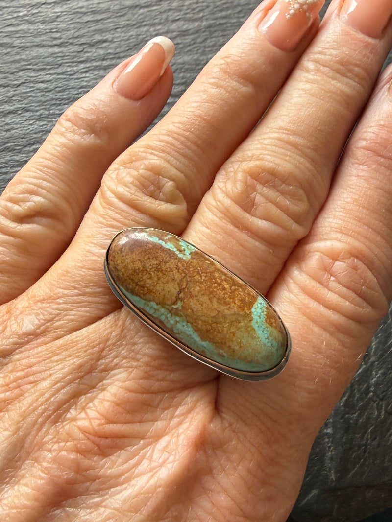 Large oval Nevada turquoise ring on a sterling silver band